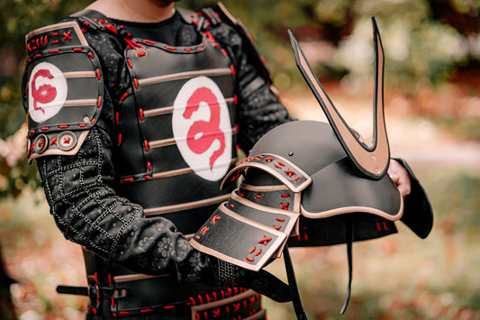 SokolArmory Japanese Samurai steel armor with black cuirass, red lacing, shoulder plates, and separate crested helmet