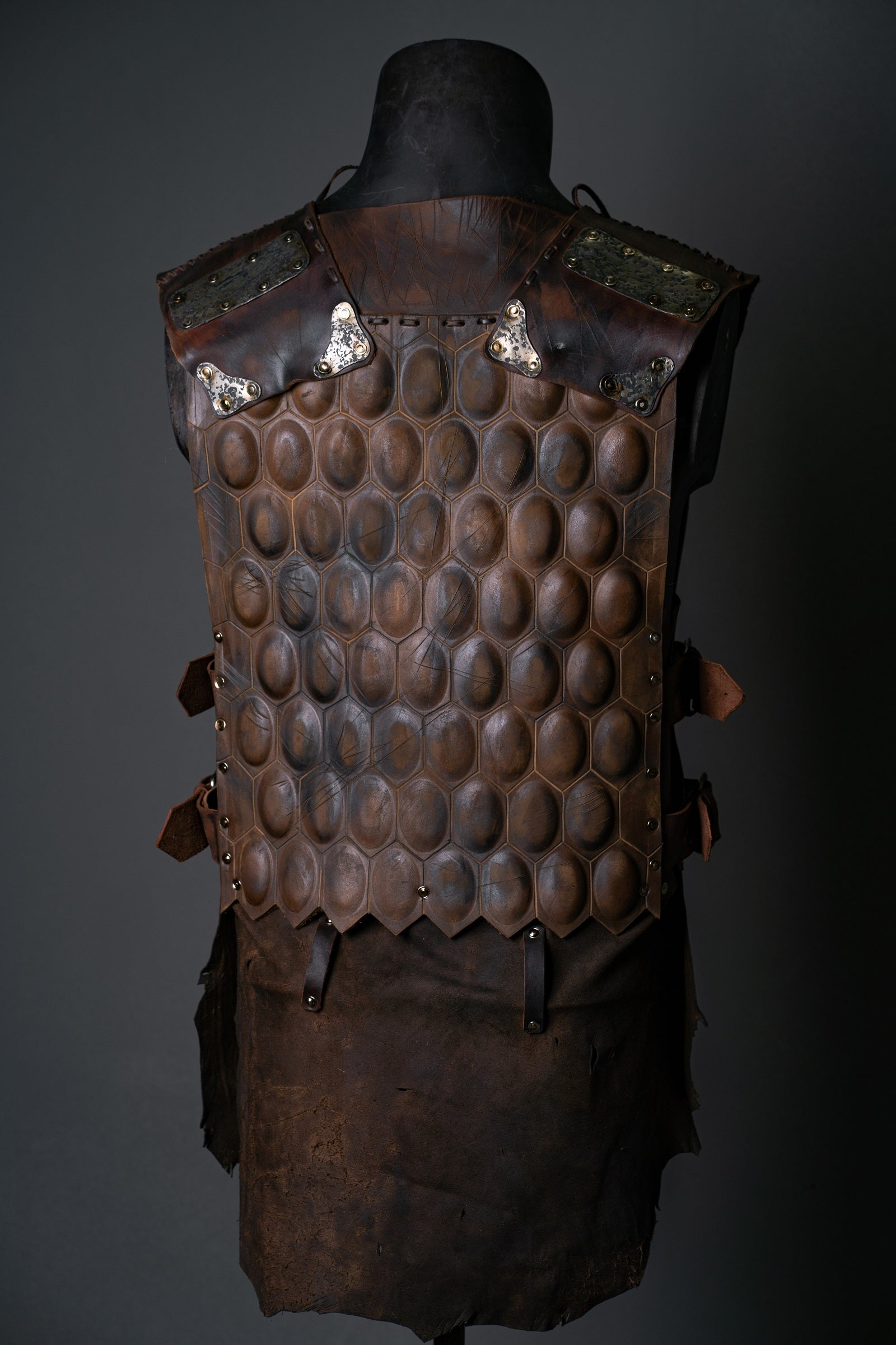 Viking leather armor with brass accents