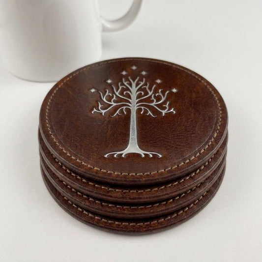 Set of four brown cowhide leather coasters embossed with the White Tree of Gondor