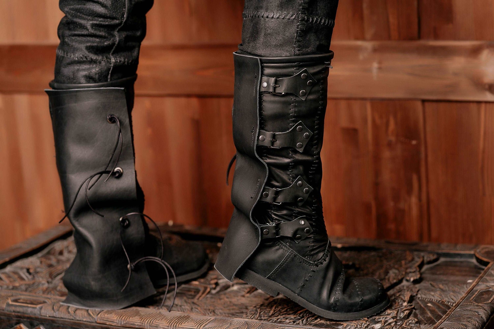 Black leather high boots with buckles