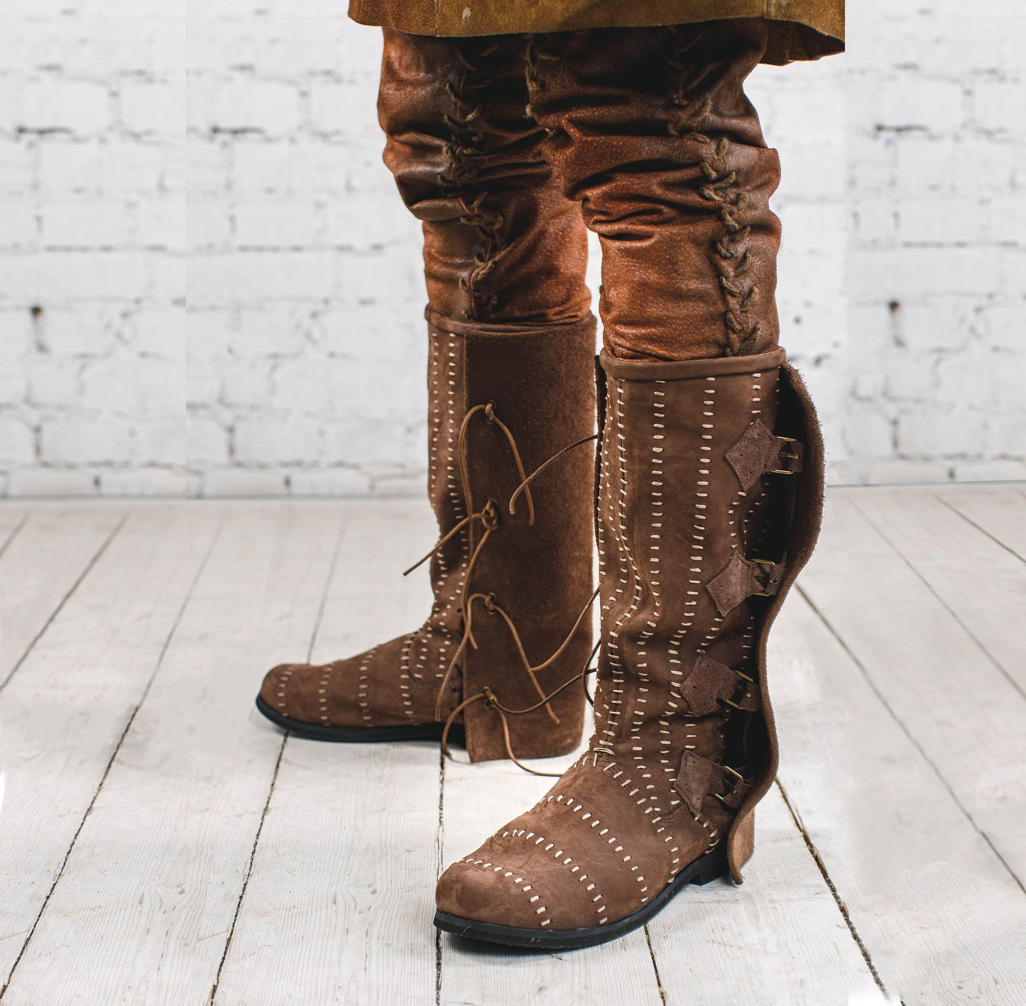 Medieval leather high boots with buckles