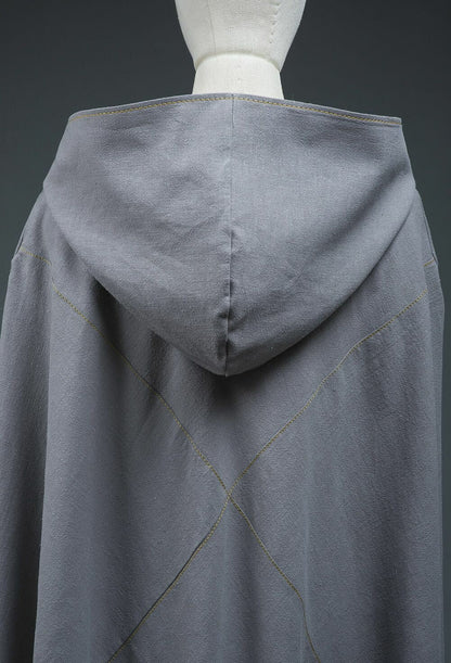 Close-up of hood and back construction on gray-lilac cotton cloak