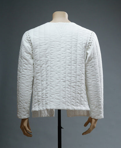 Back view of ivory quilted cotton medieval jacket