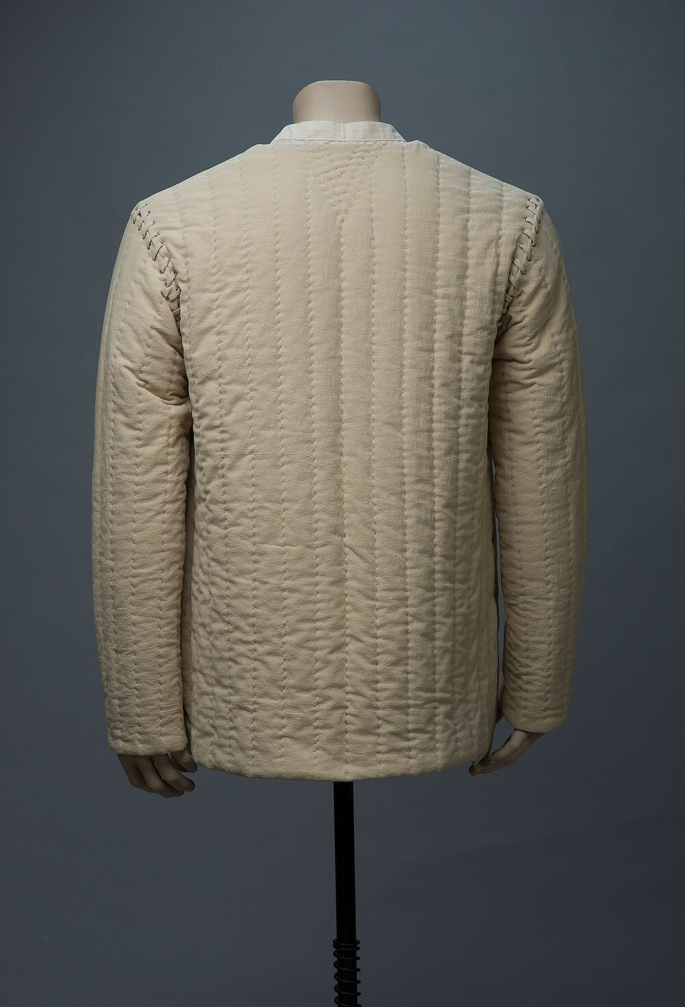 Back view of natural beige quilted cotton jacket