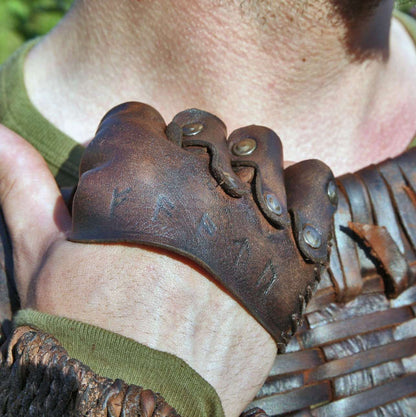 a close up of a brown and black shoe 