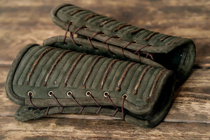 Green leather bracers