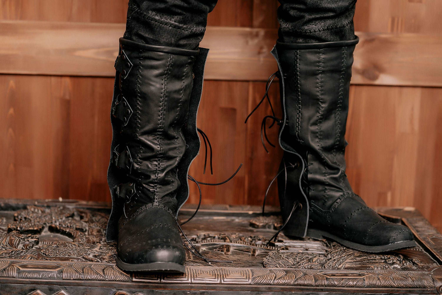 Black leather high boots with buckles