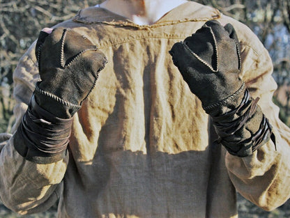 a statue of a baseball glove and a glove 