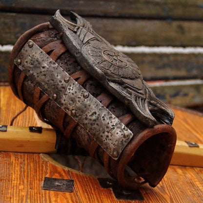 a close up of a skateboard on a wooden floor 