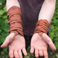 Medieval leather bracers with ribbons