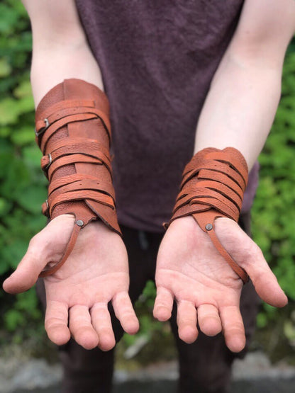 Medieval leather bracers with ribbons