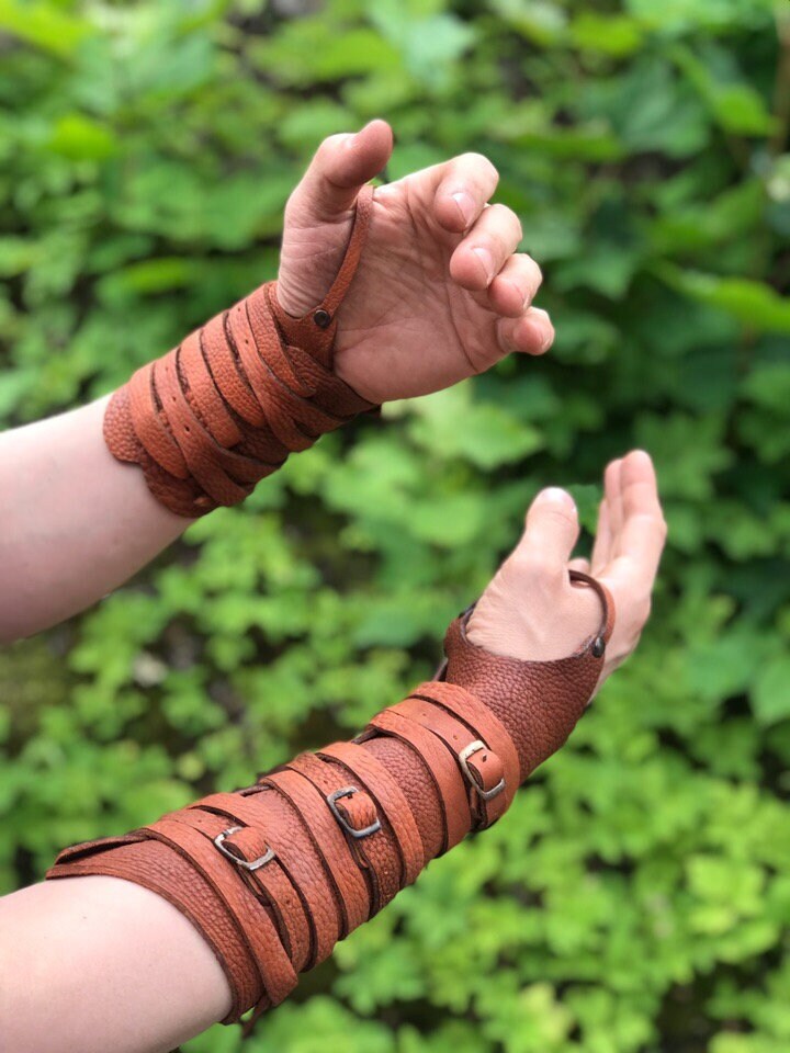 Medieval leather bracers with ribbons