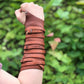 Medieval leather bracers with ribbons