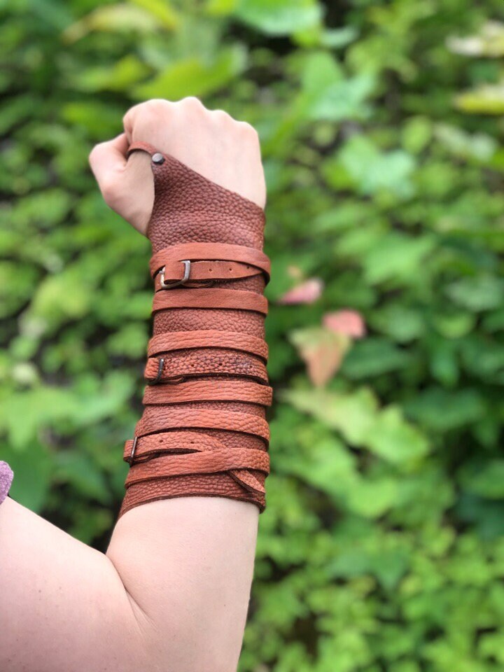 Medieval leather bracers with ribbons