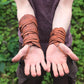 Medieval leather bracers with ribbons