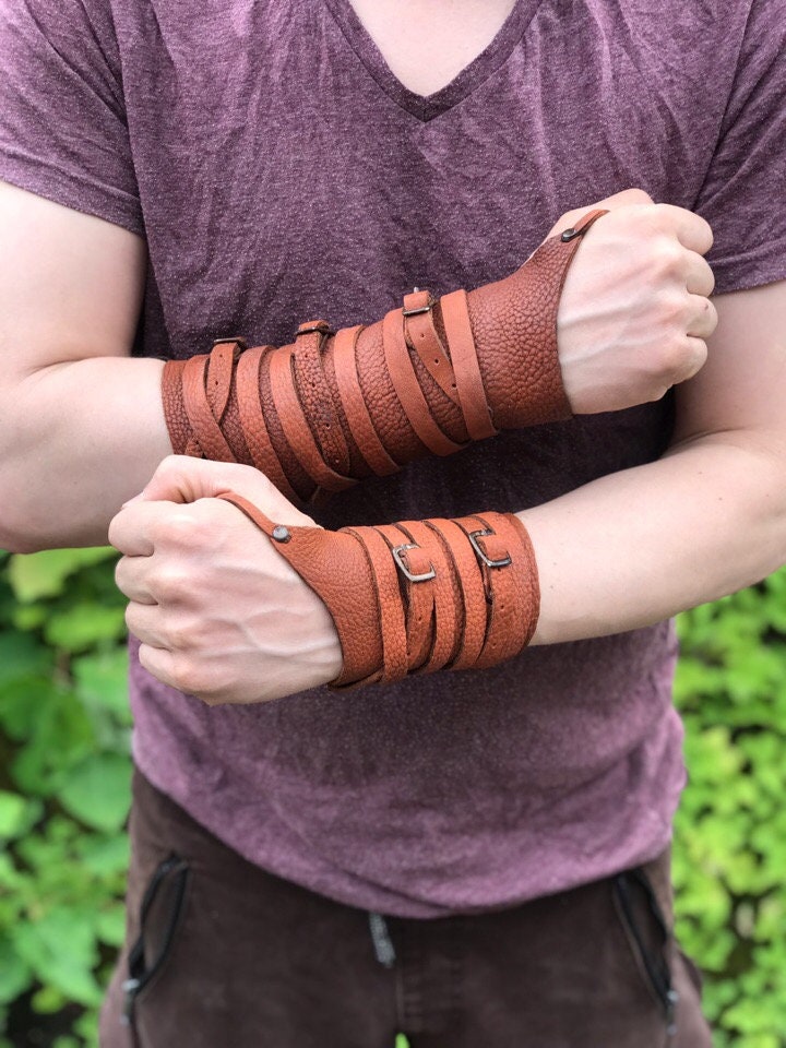 Medieval leather bracers with ribbons