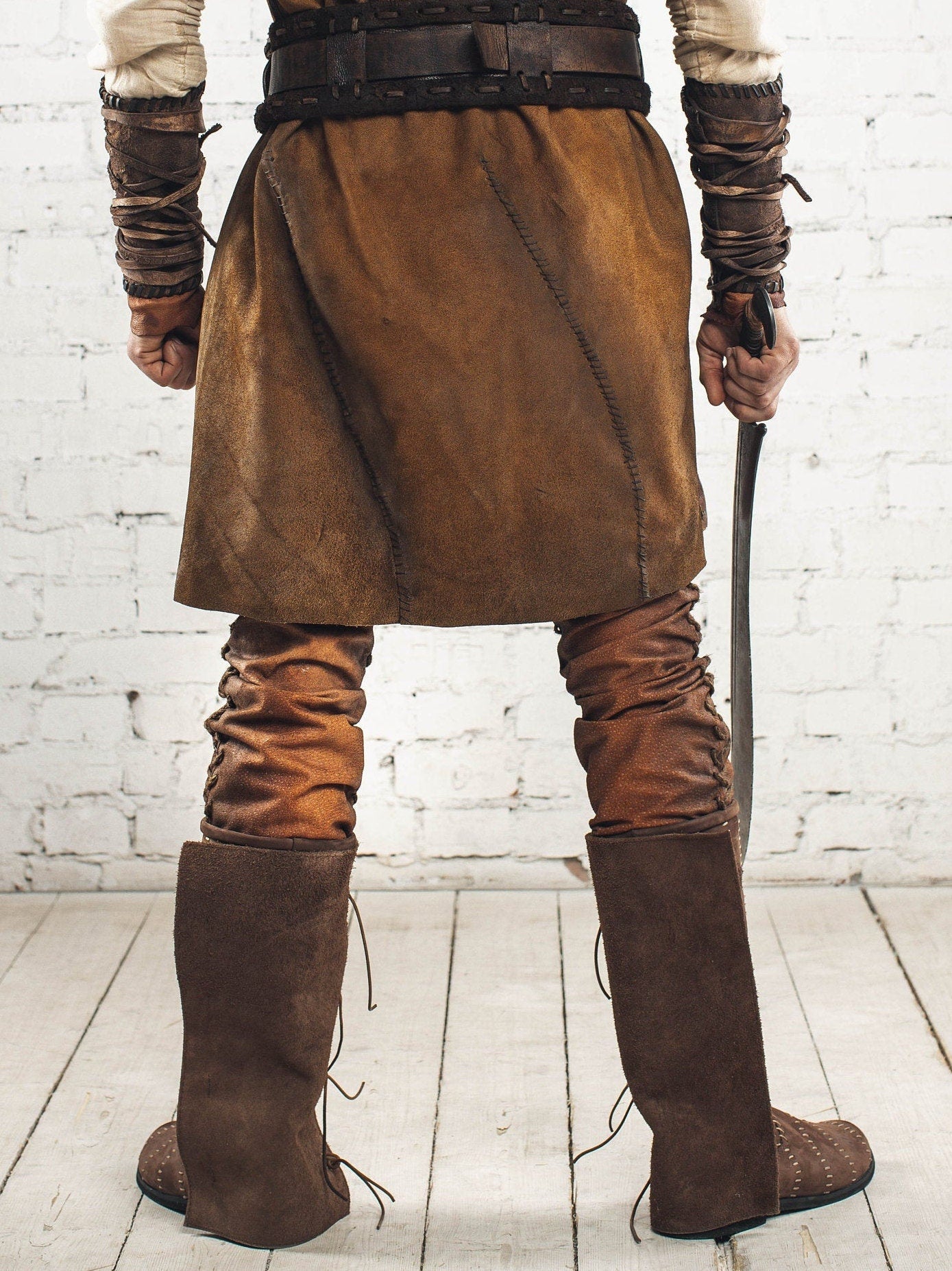 Medieval leather high boots with buckles