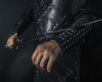 Medieval leather bracers with rivets